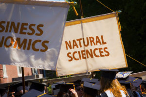 Academic department flags at Commencement