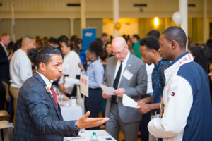 Students network at the Alumni Networking event in Smith Hall.