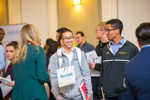 Students network at the Alumni Networking event in Smith Hall.