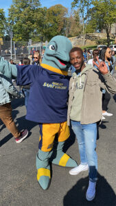 Jaemon Williams with Vinny the Dolphin. 