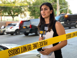 Michelle Ross by the police tape. 