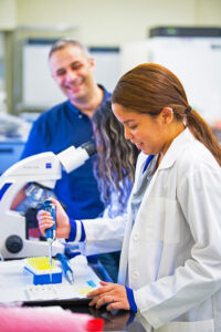 Student faculty research in a laboratory.