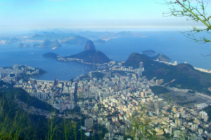 A photo looking down on Rio from a hilltop above the city.