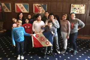 Student group poses with Mount student.