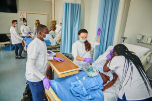 Students in a nursing lab.
