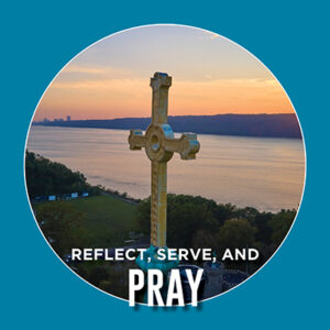 Button saying "Reflect, Serve, and Pray"