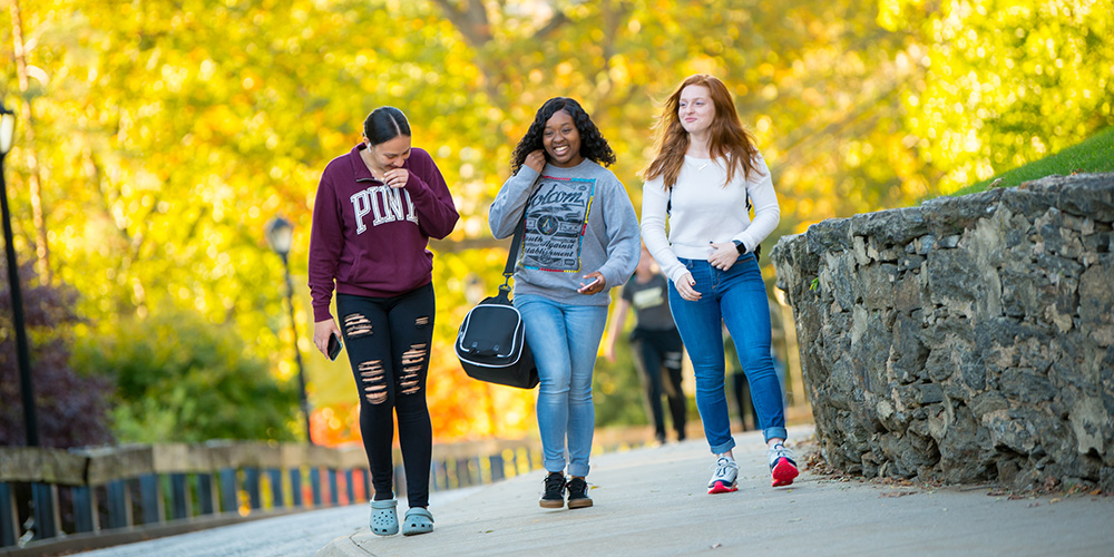 Students at the College walk up Founders Hill.