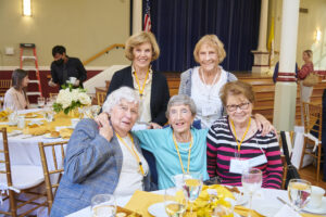 CMSV alums smile for a photo in Smith Hall